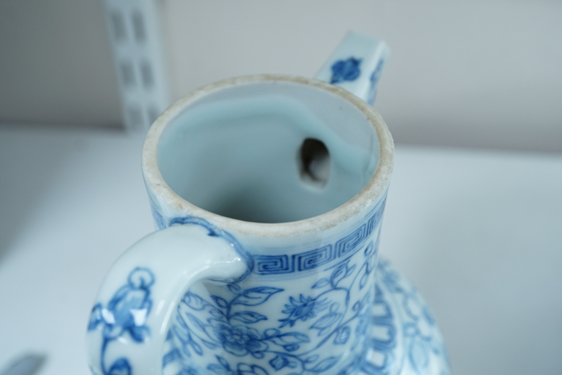 A Chinese blue and white ewer, Hongzhi mark, probably Qing dynasty